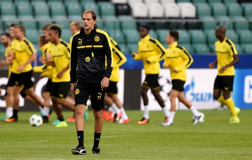 Tuchel says to be happy at Dortmund.