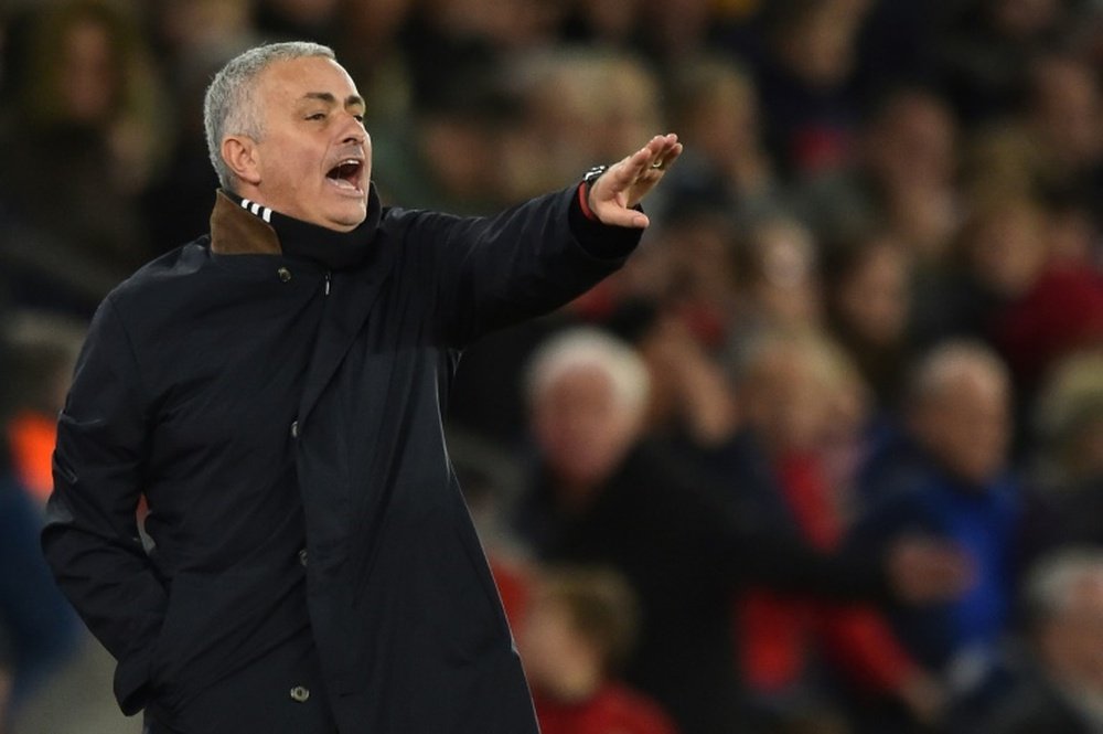 Mourinho says a top-four finish would be a 'mircale'. AFP