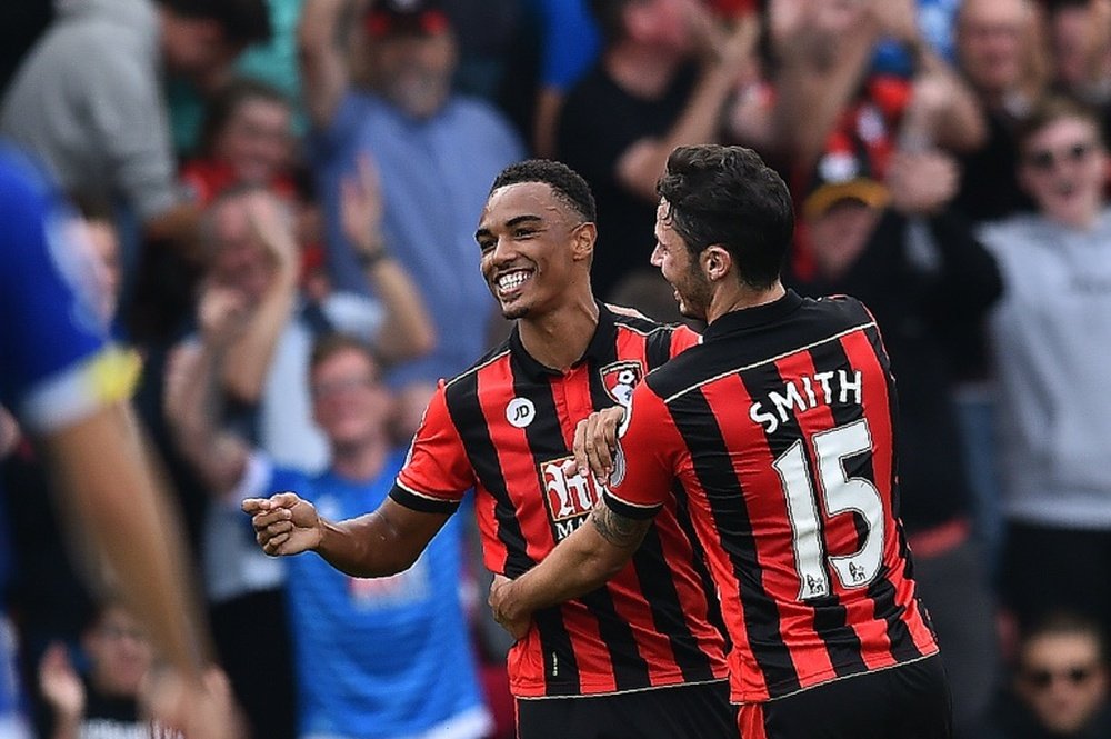 Junior Stanislas (left) scored a double as Bournemouth beat Hull 6-1