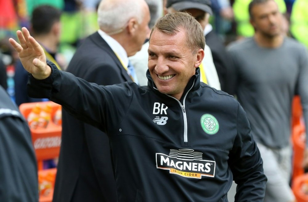 Celtics manager Brendan Rodgers acknowledges supporters ahead of a pre-season match in Dublin, on July 30, 2016