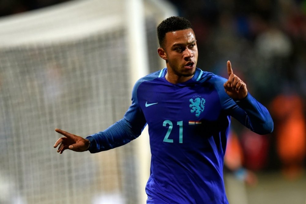 Netherlands' Memphis Depay celebrates after scoring a goal against Luxembourg. AFP