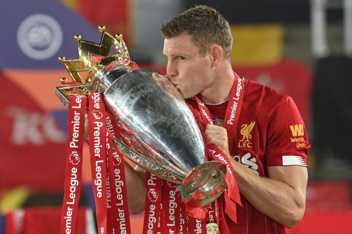 Jamer Milner prolonge l'aventure avec Liverpool. AFP