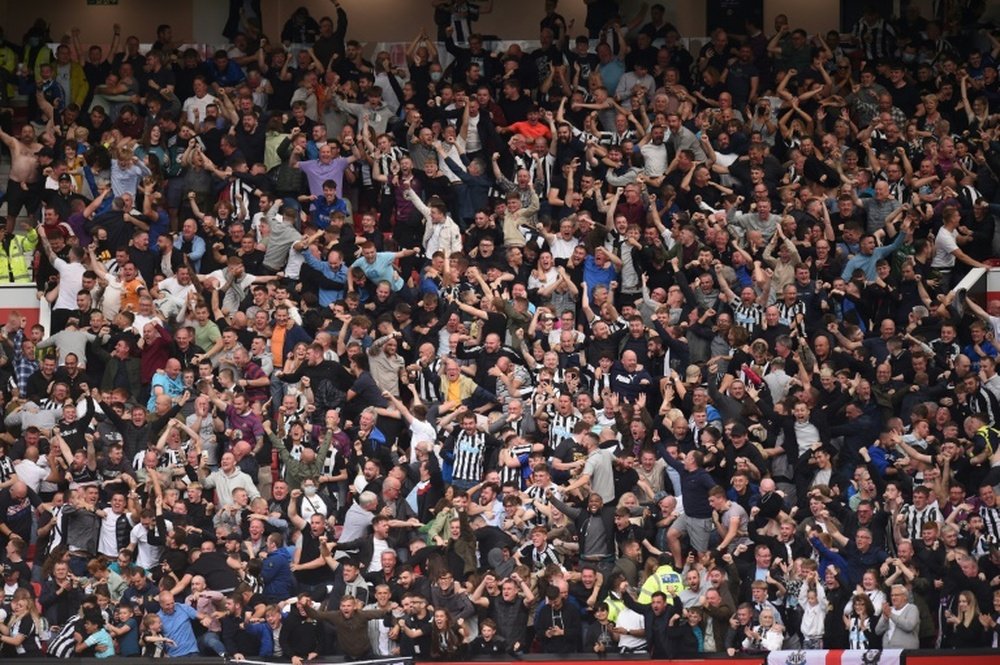 Newcastle fans dream big. AFP