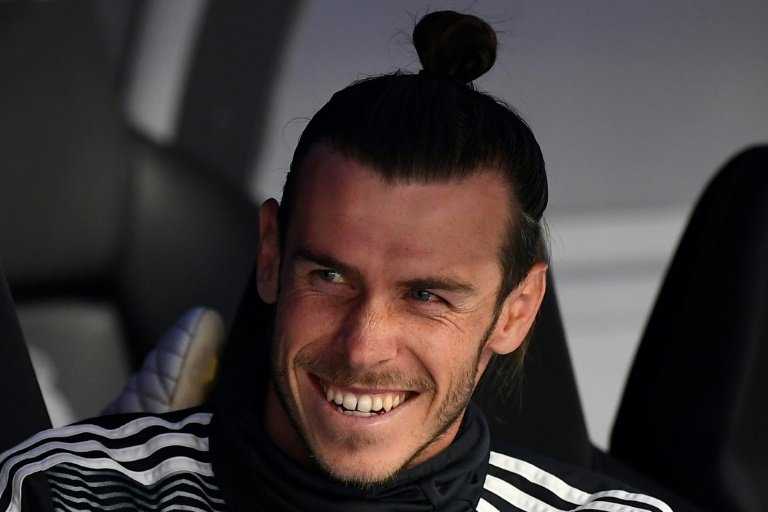 Ni los rumores ni las palabras de Zidane borran la sonrisa de Bale. AFP