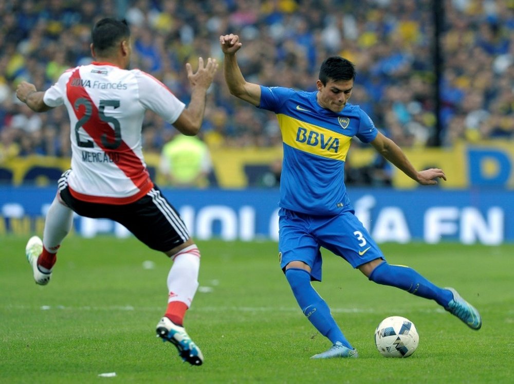 Boca's Jonathan Silva (R) and River Plate's Gabriel Mercado in action in the last superclasico. AFP