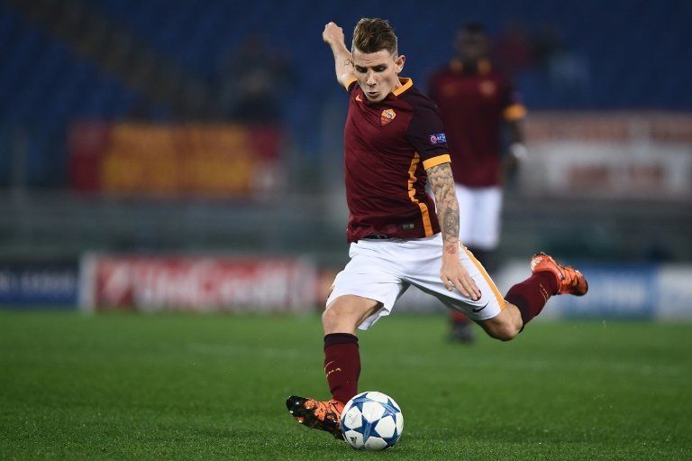 Romas defender from France Lucas Digne kicks the ball during the UEFA Champions League football match AS Roma vs Bate Borisov on December 9, 2015 at the Olympic Stadium in Rome