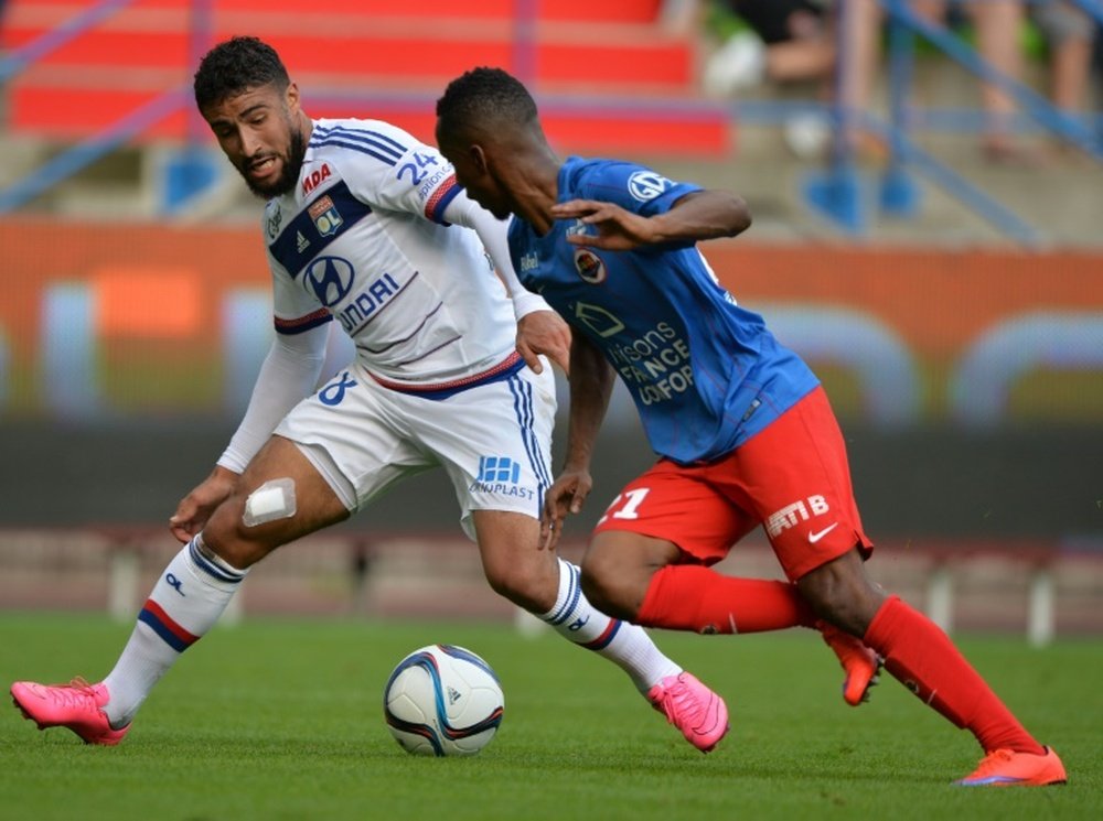 Lyons French midfielder Nabil Fekir (L) vies with Caens French-Comoran defender Chaker Alhadhur during the French L1 football match on August 29, 2015, at the Michel dOrnano stadium, in Caen, western France