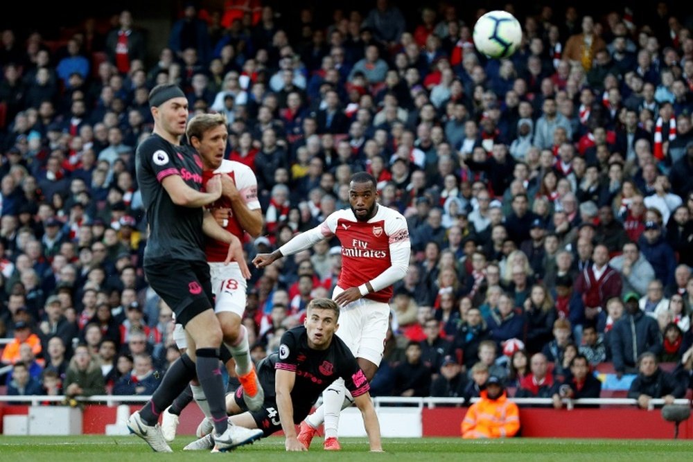 Alexandre Lacazette's superb strike put Arsenal on course for victory against Everton. AFP