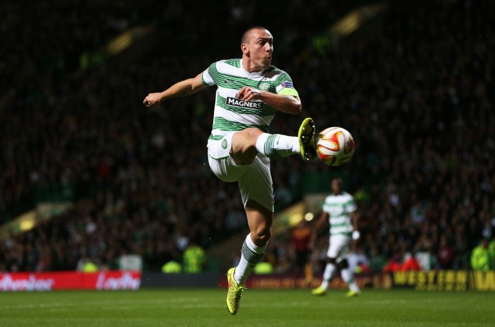 Scott Brown limped off in Celtic's friendly win. AFP