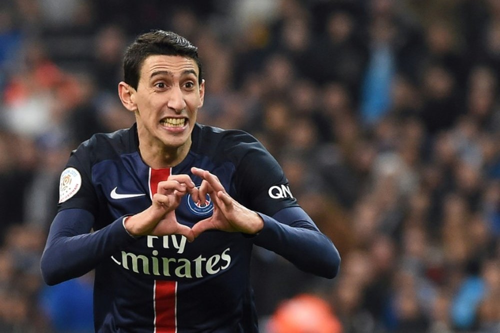 Paris Saint-Germains forward Angel Di Maria (R) celebrates after scoring a goal during a French L1 football match against Marseille on February 7, 2015 at the Velodrome stadium in Marseille, southern France