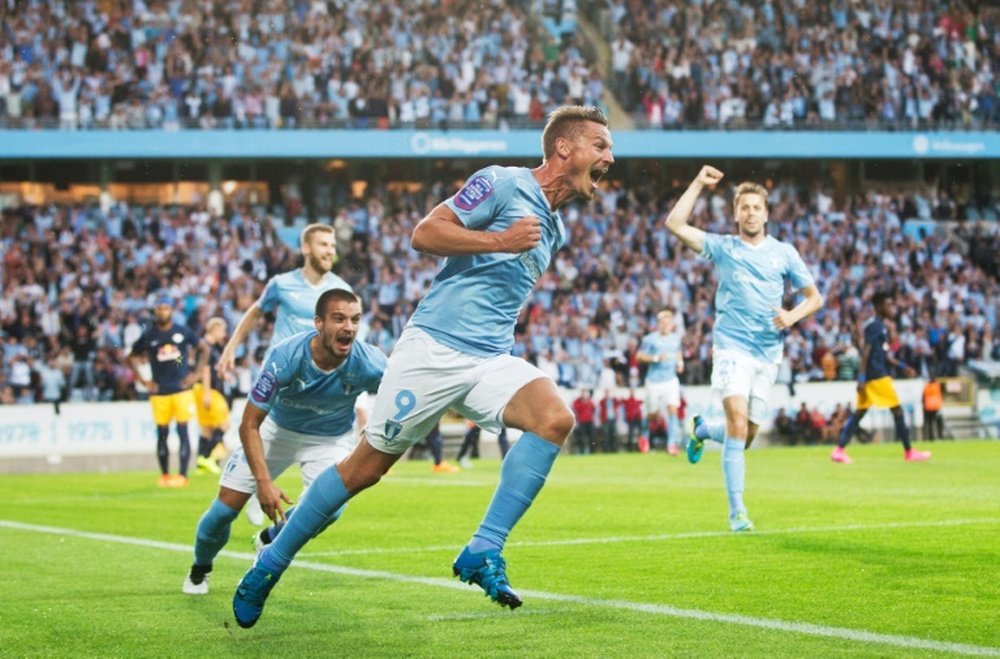Malmos Markus Rosenberg celebrates scoring a goal during an UEFA Champions League qualifying round match in Malmo, Sweden, on August 5, 2015