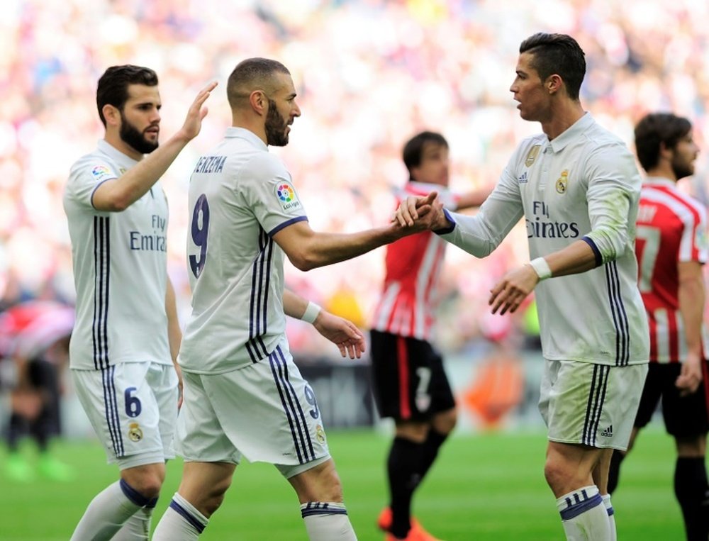 Benzema and his form will threaten Ronaldo. AFP