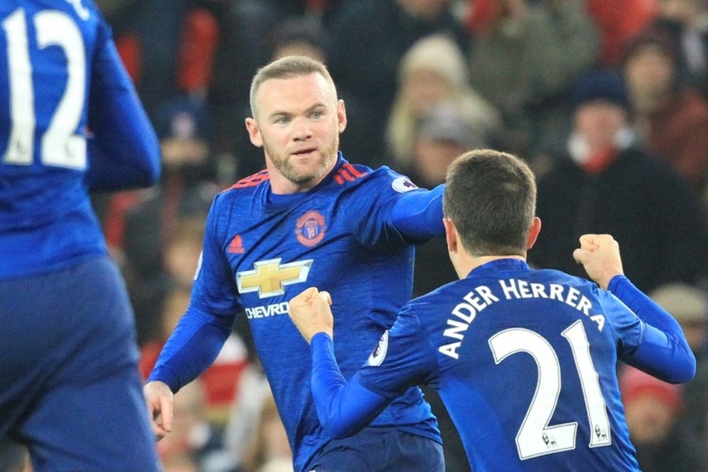 Rooney salvó un punto para el United. AFP
