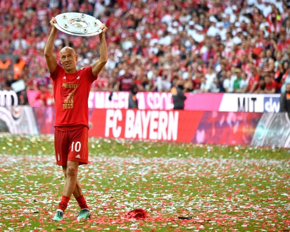 Robben acknowledged he misses football . AFP