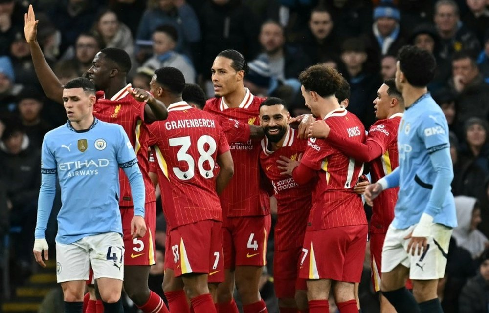 Mohamed Salah (centre) célèbre un but face à Manchester City. AFP