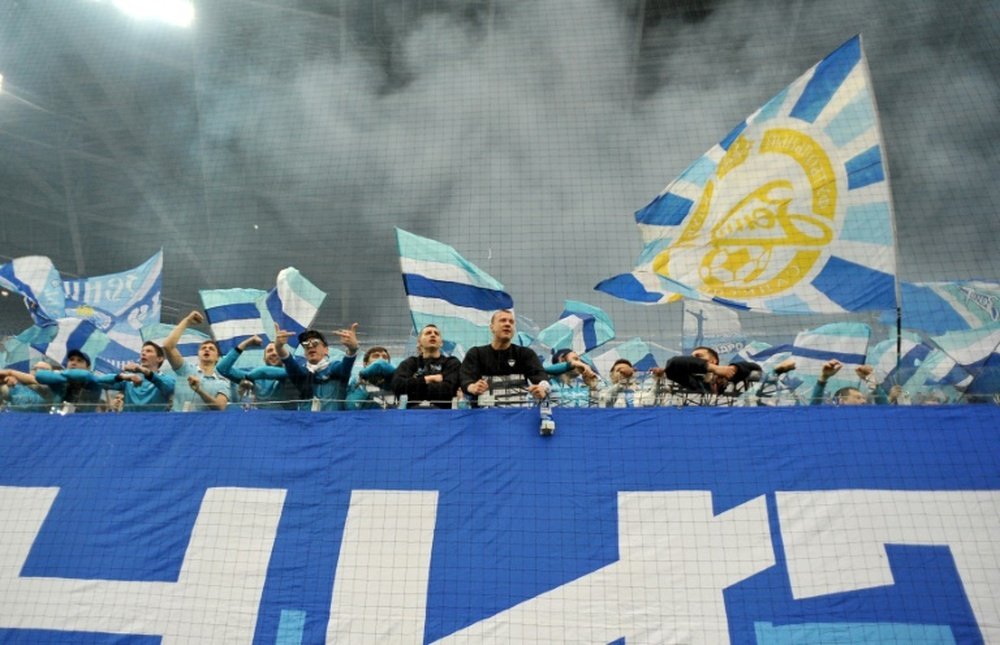 FC Zenits fans cheer for their team during a Russian League football match