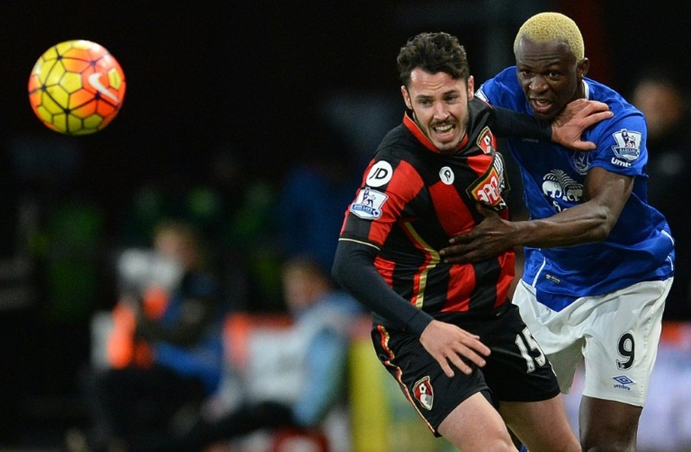 Bournemouths defender Adam Smith (L) vies against Evertons striker Arouna Kone during the English Premier League football match at the Vitality Stadium in Bournemouth, southern England on November 28, 2015