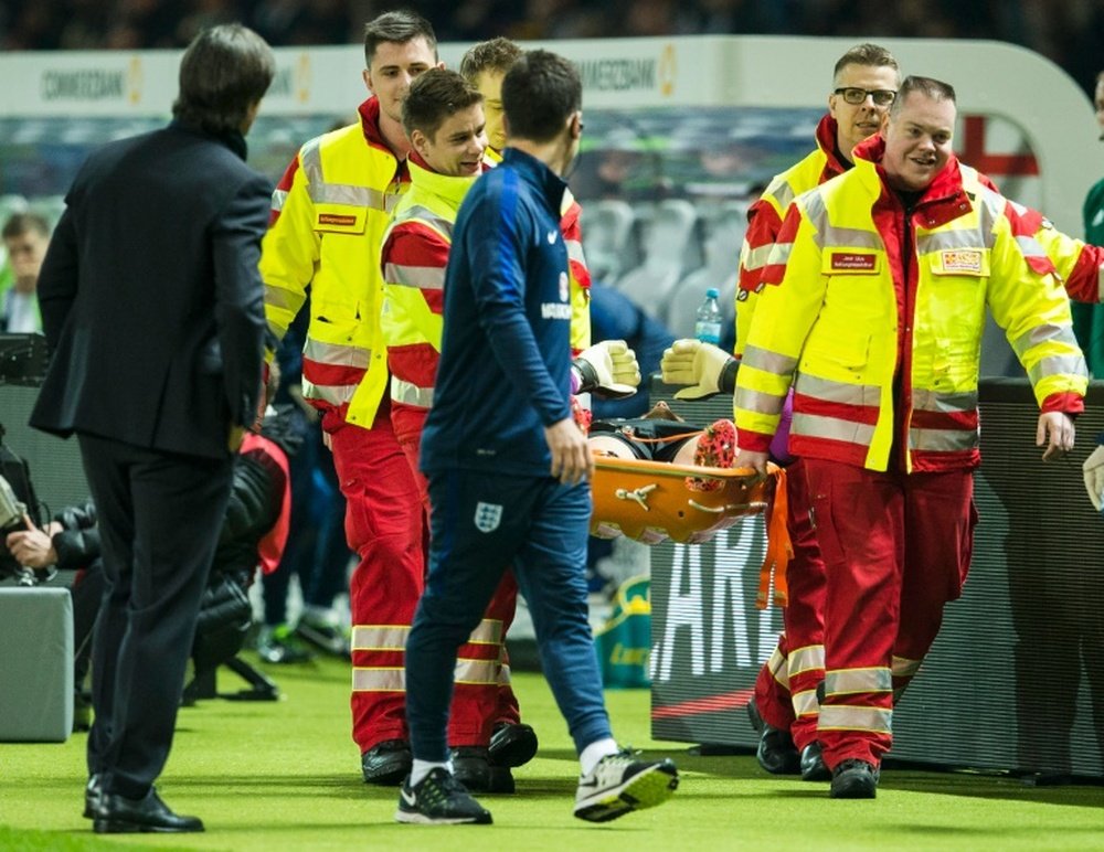 England’s goalkeeper Jack Butland was stretchered off during their friendly. BeSoccer