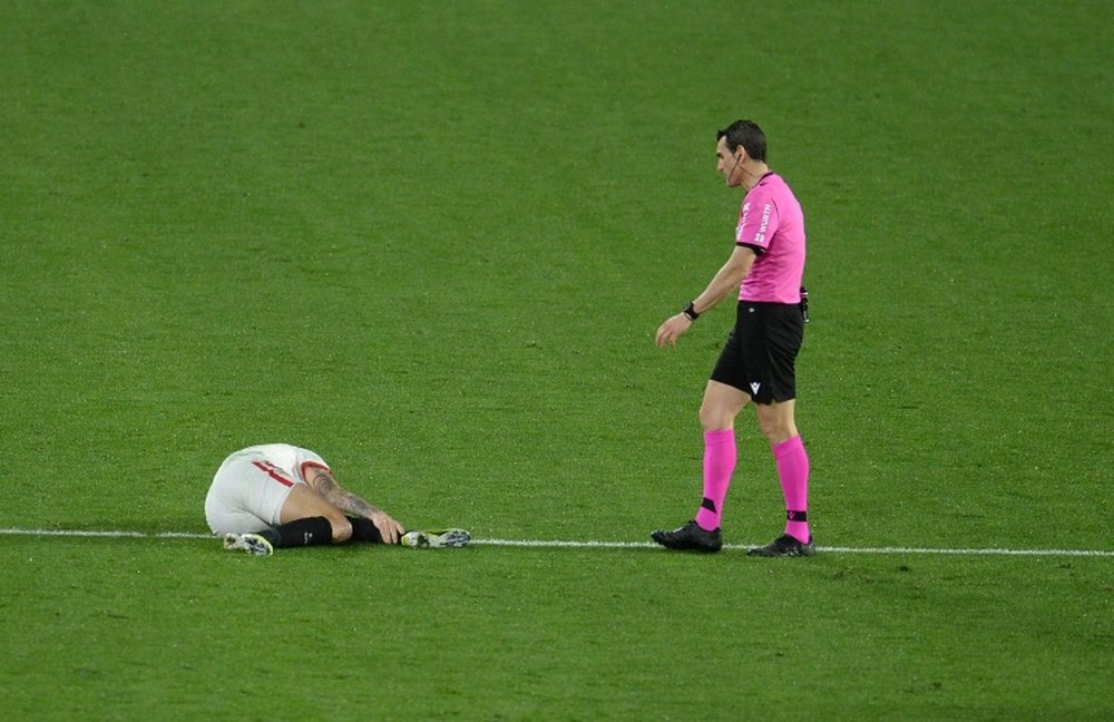 Lucas Ocampos had to go off on a stretcher. AFP