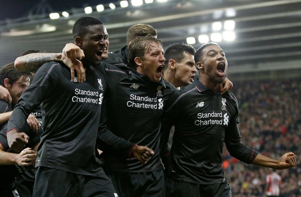 Jugadores del Liverpool, celebrando un gol. AFP