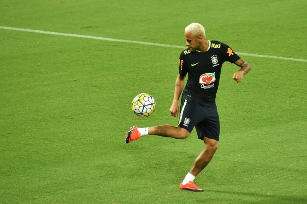 Brazils football team player Neymar takes part in a training session at the Arena Dunas stadium in Natal, Brazil