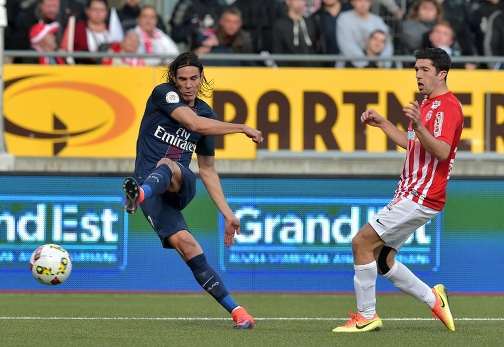 Edinson Cavani (left) scored again as Paris Saint-Germain beat Ligue 1 strugglers Nancy 2-1
