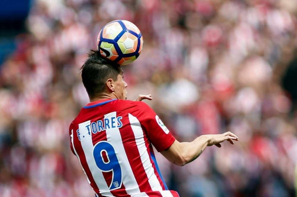 Fernando Torres a fait ses adieux au Calderon avec un doublé. AFP