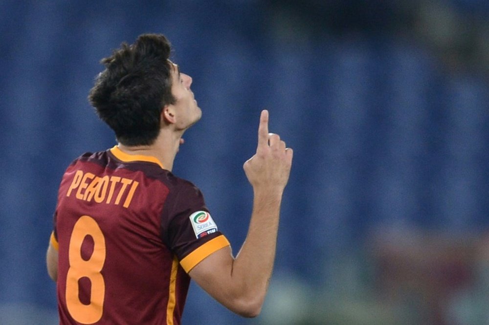 Romas midfielder Diego Perotti celebrates after scoring during an Italian Serie A football match against Sampdoria at the Olympic Stadium in Rome on February 7, 2016