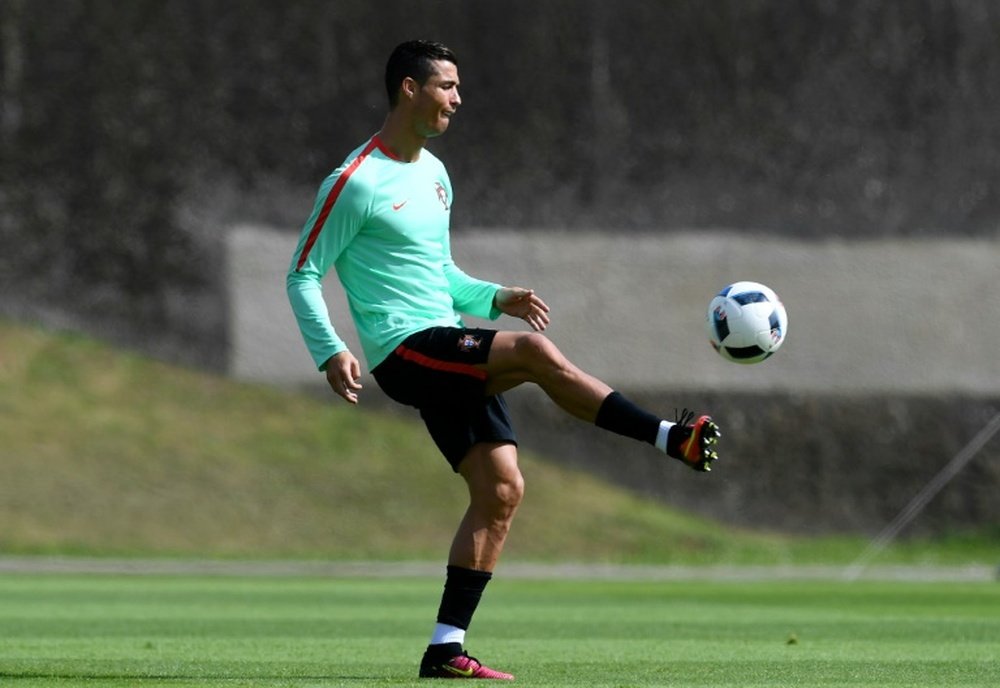 Cristiano trains at the stadium while in quarantine. AFP