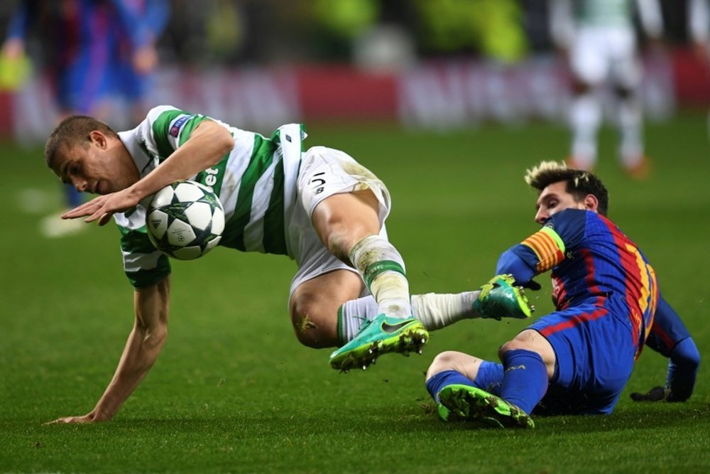 Simunovic could move to Lille if Celtic accept the £5m offer. AFP