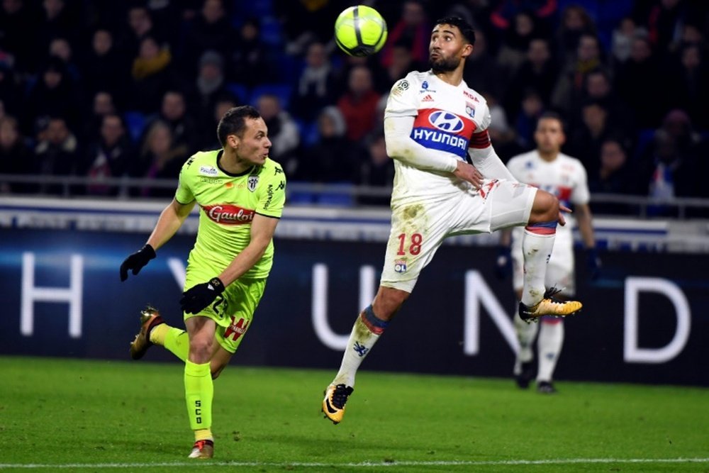 Lyon held at home by 10-man Angers. AFP