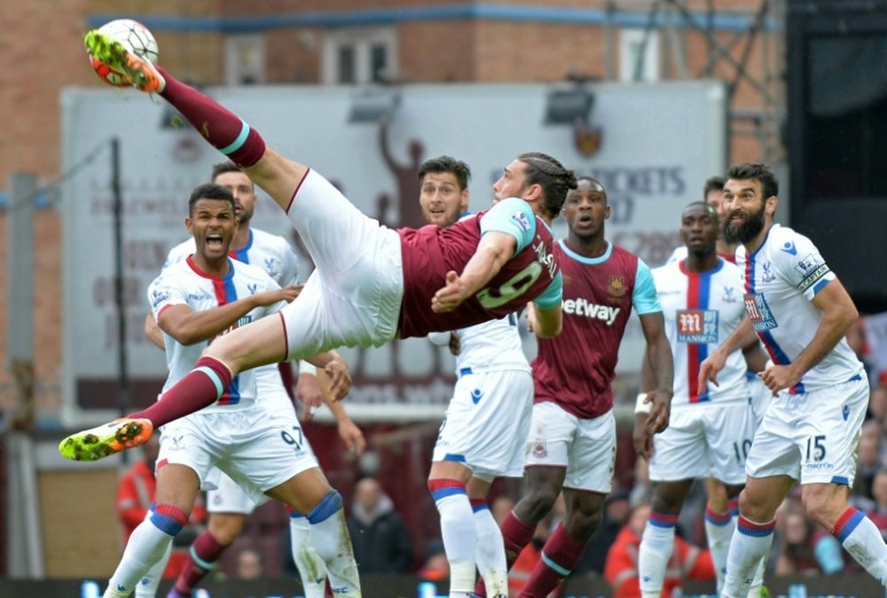 West Ham United's Andy Carroll kicks an unsuccessful shot during their English Premier League match against Crystal Palace, at The Boleyn Ground in Upton Park, east London, on April 2, 2016