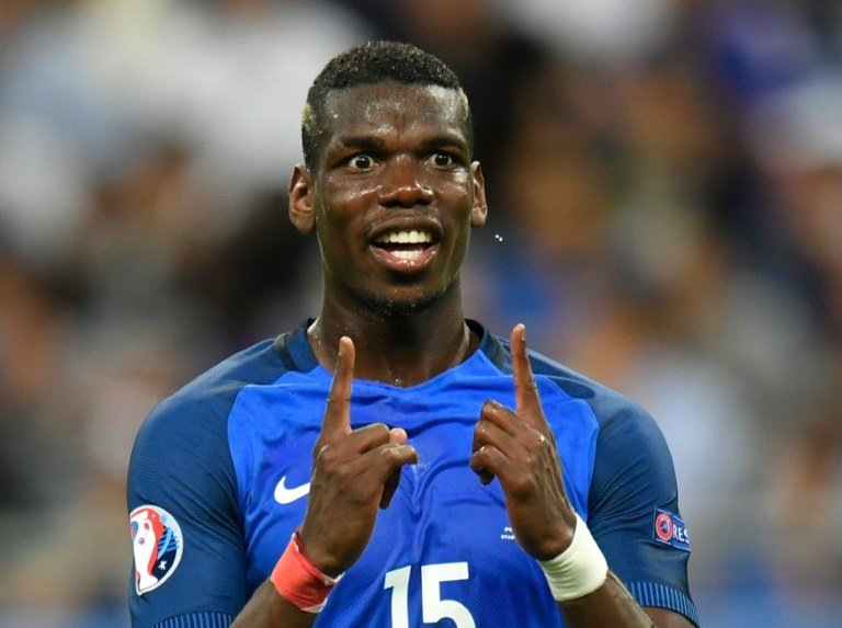 Manchester United announced Tuesday that Paul Pogba has signed a five-year contract, marking his return to a club that had let him go for a token fee in 2012