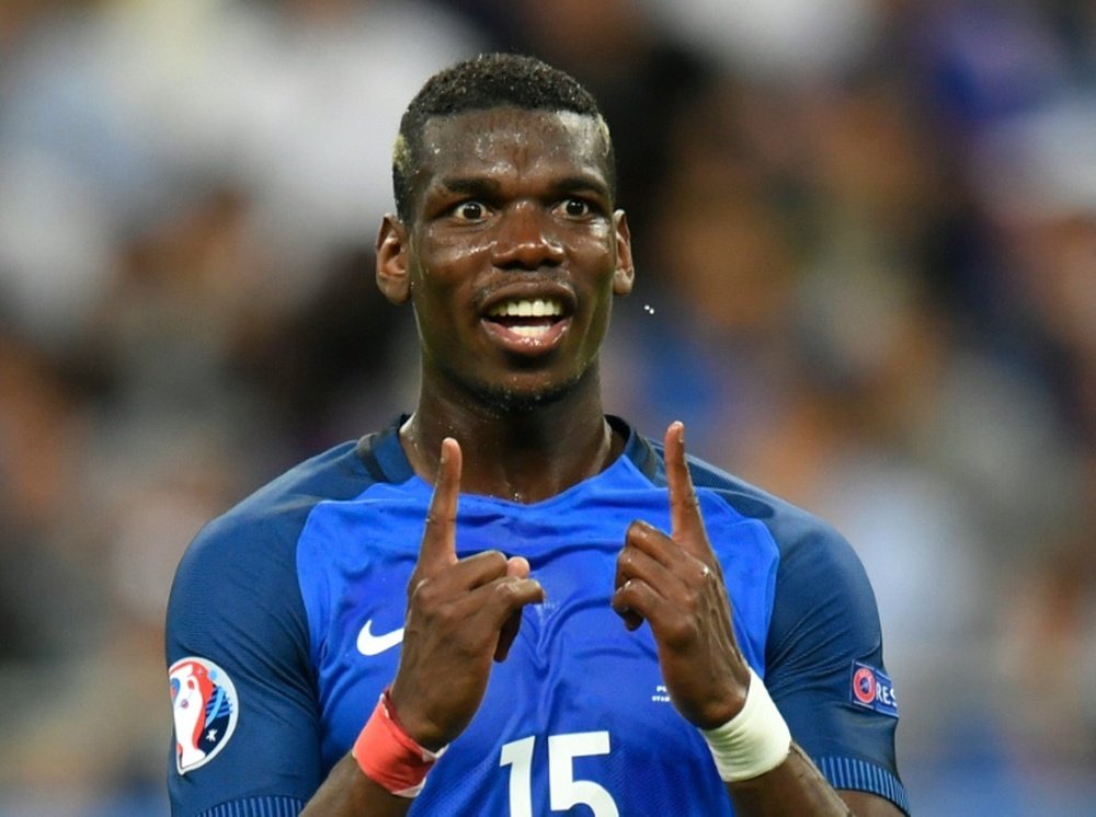 Manchester United announced Tuesday that Paul Pogba has signed a five-year contract, marking his return to a club that had let him go for a token fee in 2012