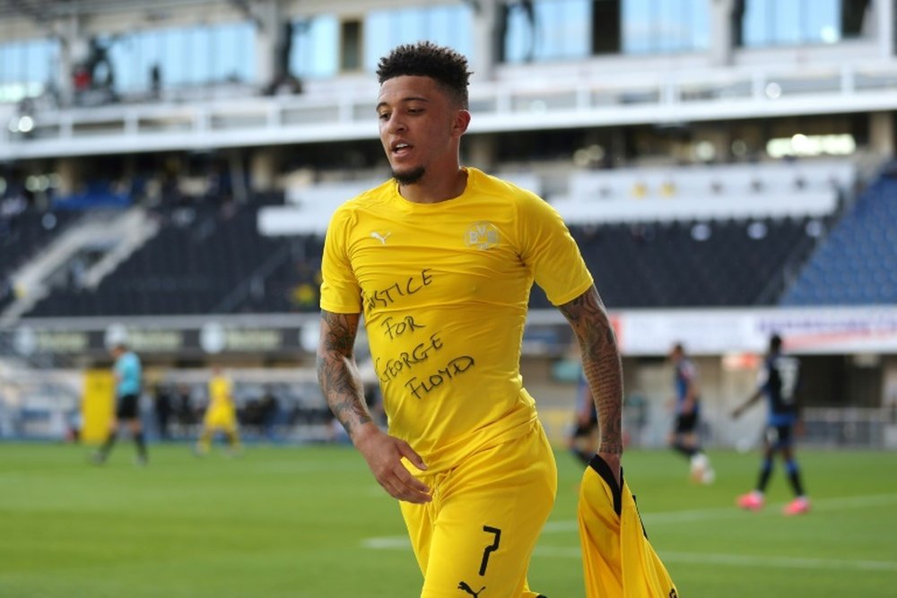 Chelsea are trying to sign Jadon Sancho. AFP