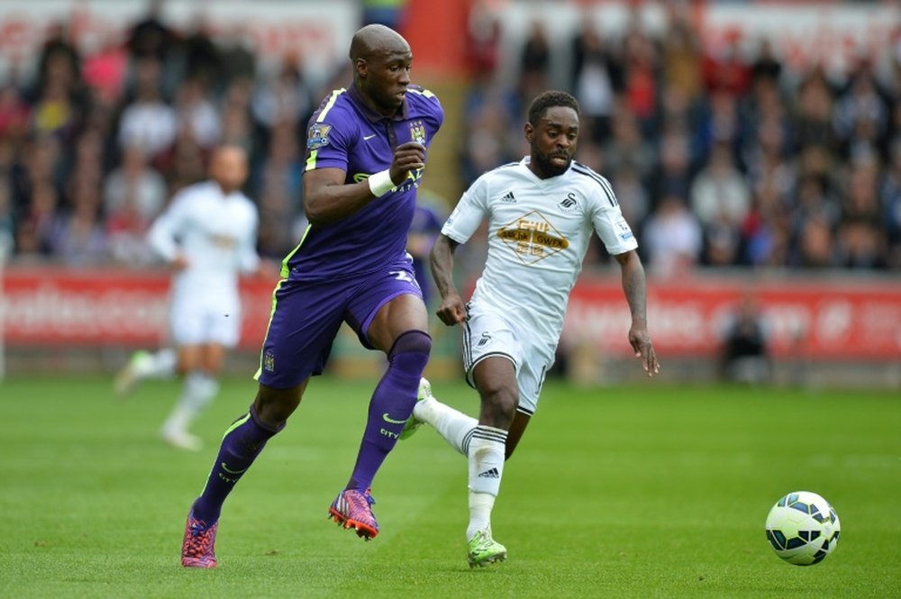 Nathan Dyer (right) will miss the rest of the season after rupturing an Achilles tendon. AFP
