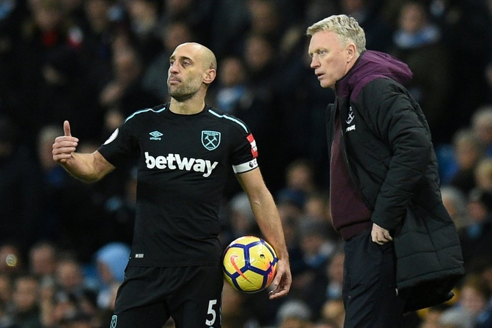 Zabaleta pictured with former West Ham United manager David Moyes. AFP