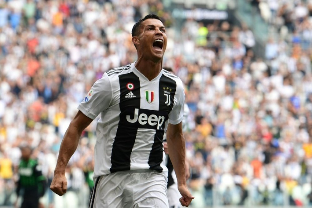 Ronaldo celebrates the first. AFP