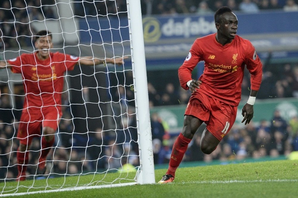Sadio Mane celebrating a goal with Liverpool. AFP