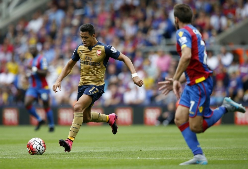 Arsenals Chilean striker Alexis Sanchez passes the ball during the English Premier League match at Selhurst Park in south London on August 16, 2015