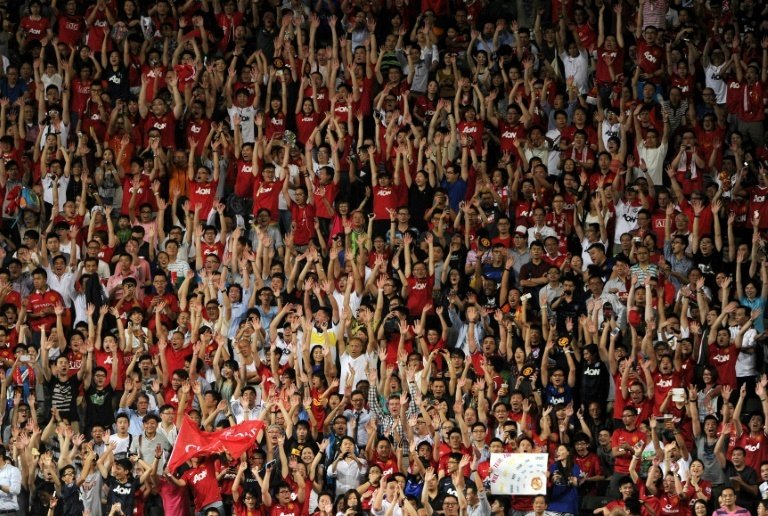 Manchester United kit maker Adidas defend 'sexist' plunging neckline of women's  shirt