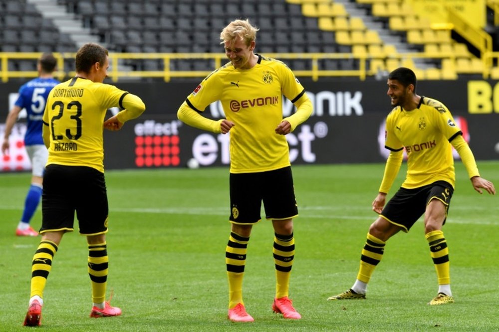 Solo el Borussia Dortmund consiguió la victoria como local. AFP