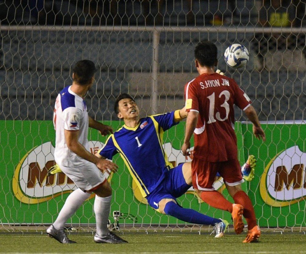 Iain Ramsay (L) of the Philippines scores the third goal against North Korea. BeSoccer
