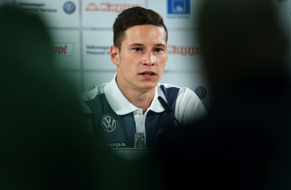 VfL Wolfsburgs newly signed midfielder Julian Draxler attends a press conference at Volkswagen-Arena in Wolfsburg, central Germany, on September 1, 2015