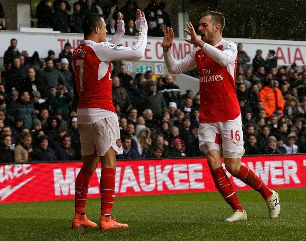 Sanchez and Ramsey are set to return for Arsenal against Everton. AFP