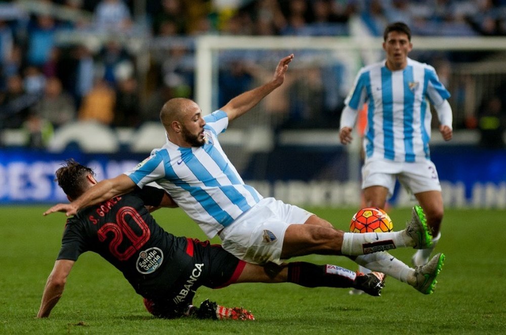 Nordin Amrabat (C), seen in Malaga on January 2, 2016, agreed to a three and a half year contract with the Hornets and will link up with Quique Sanchez Flores squad after the league match at Swansea