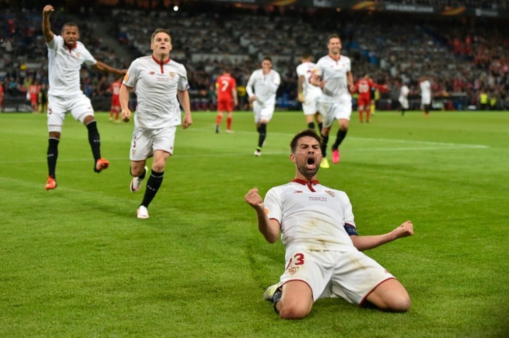 Sevillas defender and captain Coke (R) celebrates after scoring a goal during the UEFA Europa League final football match between Liverpool FC and Sevilla FC in Basel, on May 18, 2016