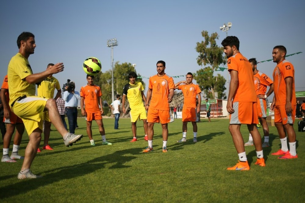 Palestinian players of Al-Ahli Hebron attend a training session in Gaza City on August 5, 2015