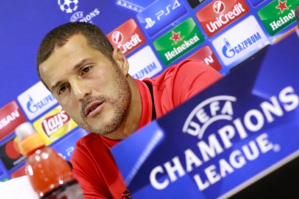 Julio Cesar attends a press conference on the eve of the Champions League match against Napoli. AFP