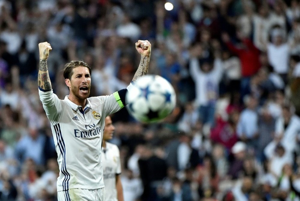 Le capitaine du Real Madrid, Sergio Ramos, célèbre la victoire contre l'Atletico Madrid en C1. AFP